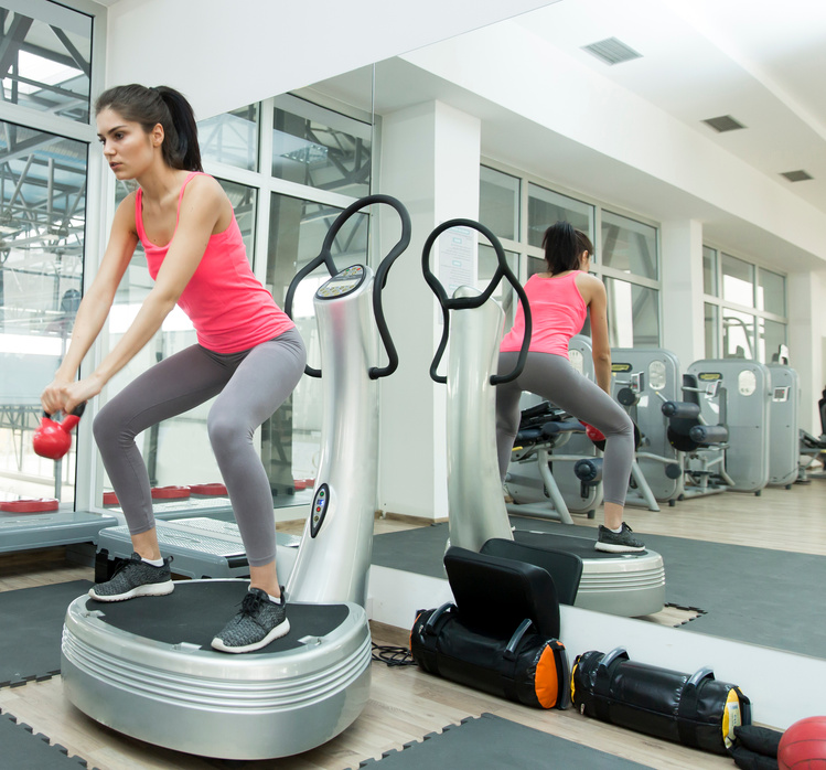 Young Woman Training in the Gym